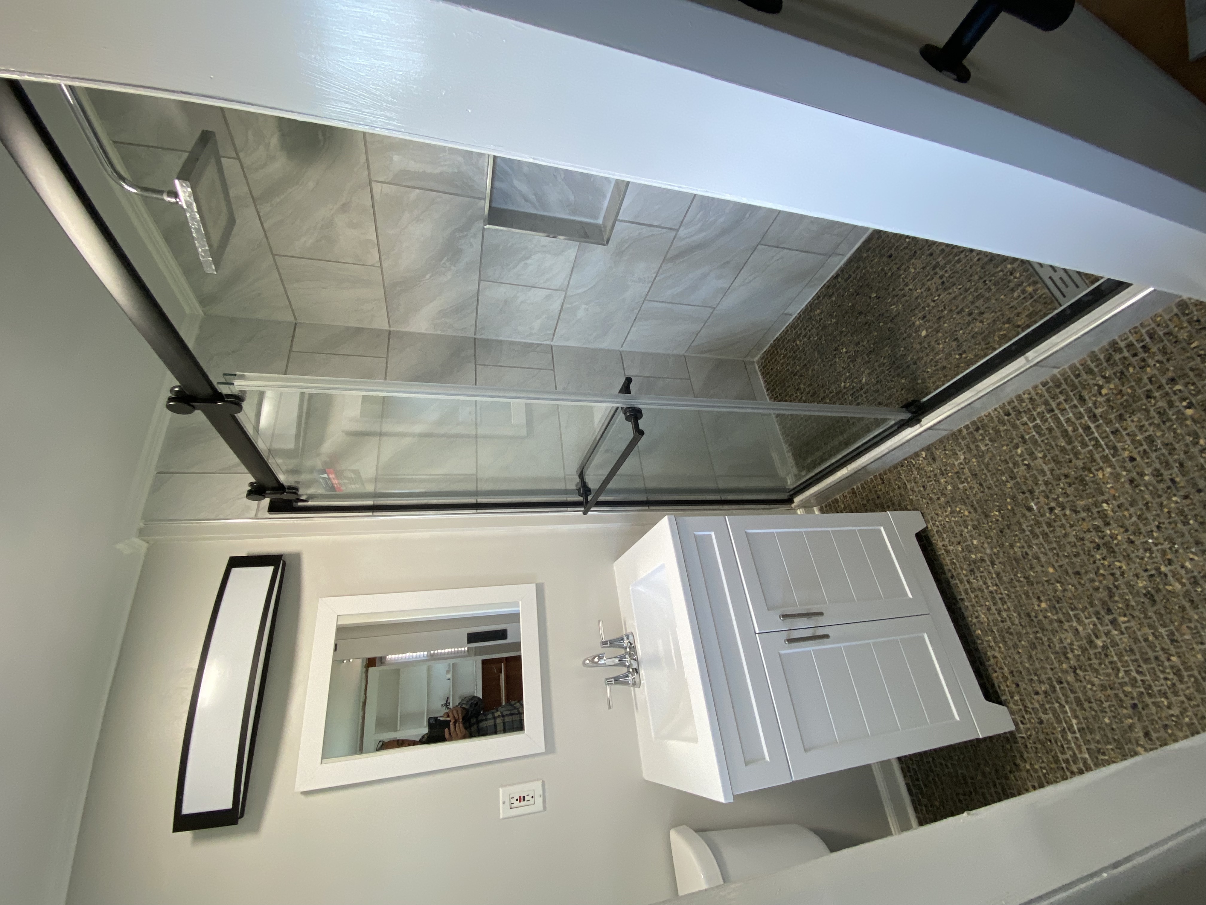 Freshly stained backyard deck at sunset