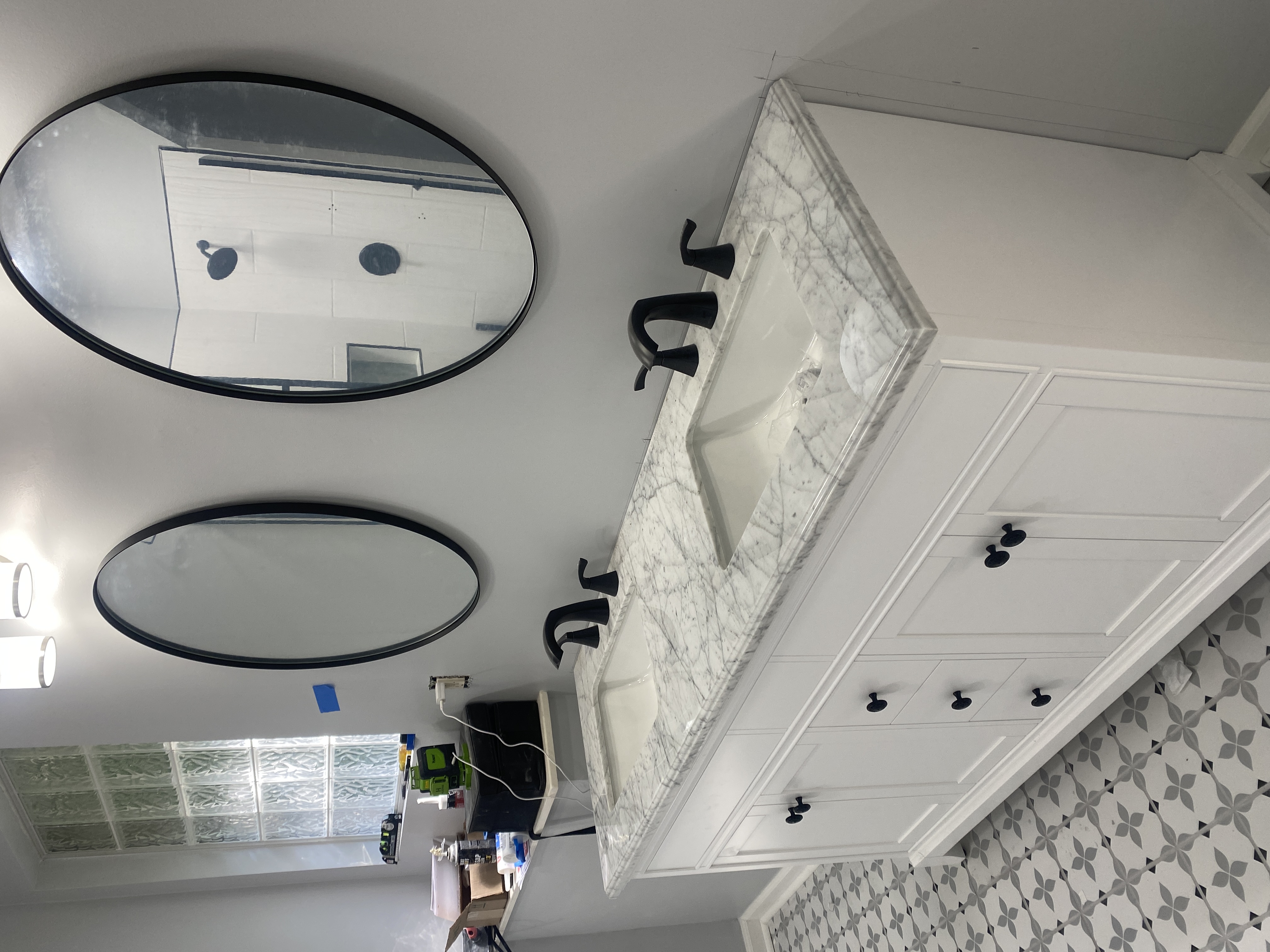 Garden enclosure with raised beds, gravel and paver path